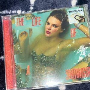 Taylor Swift CD and posters the life of a show girl